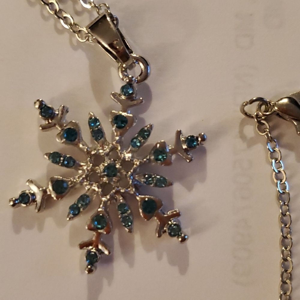 Snowflake Necklace Silver. Blue ice rhinestones. Brand new! 19" chain 1.5" charm